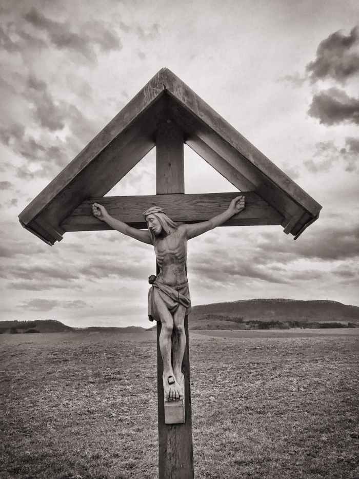 crucifix grayscale photo